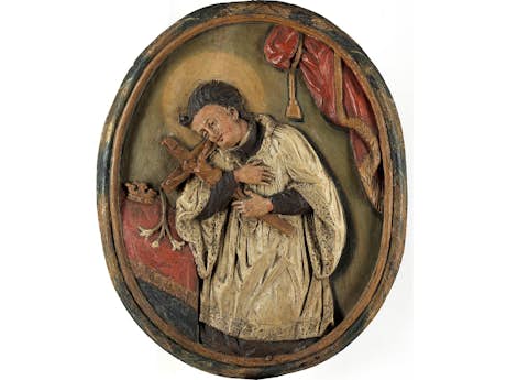 Ovales Schnitzrelief mit Darstellung des Heiligen Aloisius